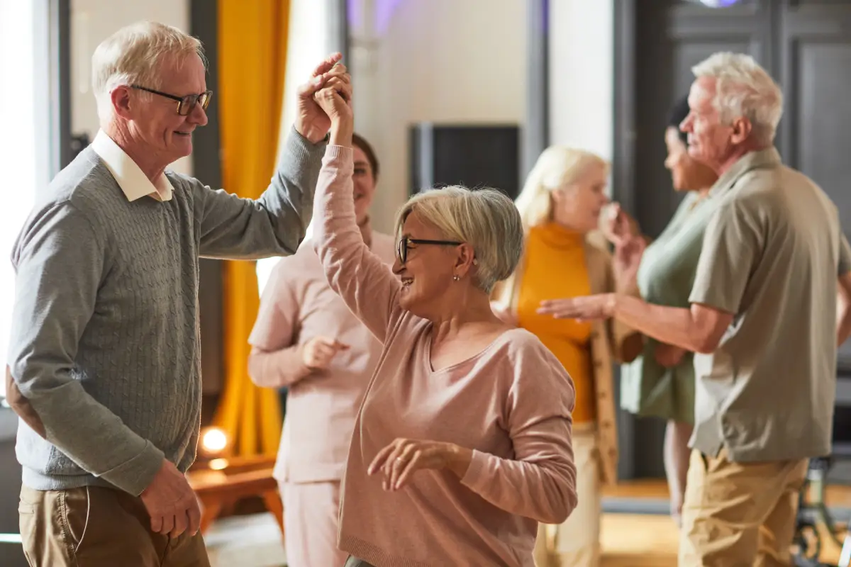 Image shows elderly people dancing